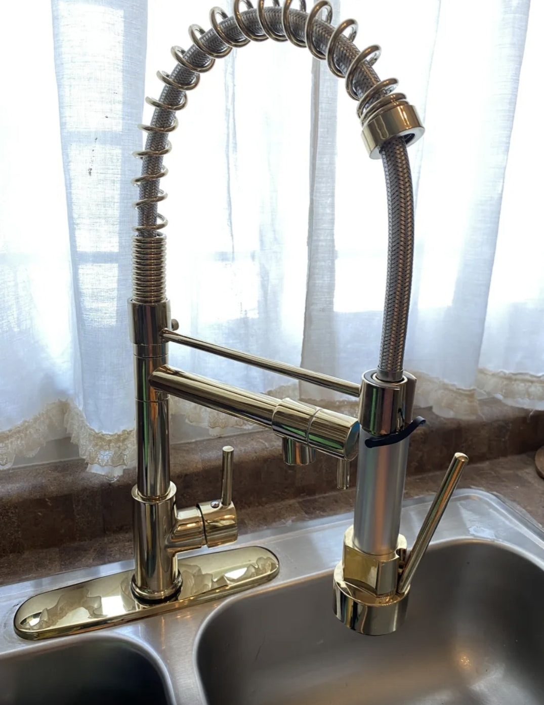 Grifo mono mando con llave flexible de acero inoxidable